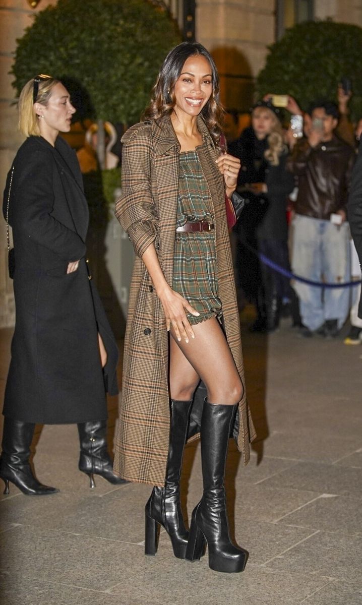 Saldaña wore thigh high black boots, adding an edge to the look