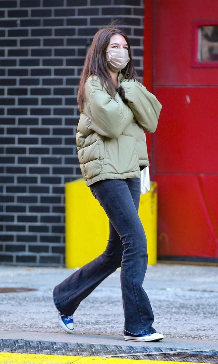 Suri Cruise is spotted walking alone in New York City.