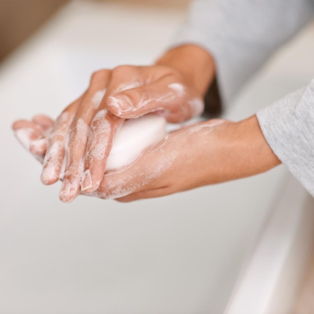 Woman washing her hands