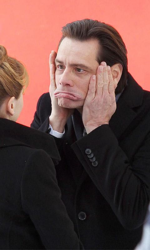 Jim Carrey avec un visage vert et des dents pointues