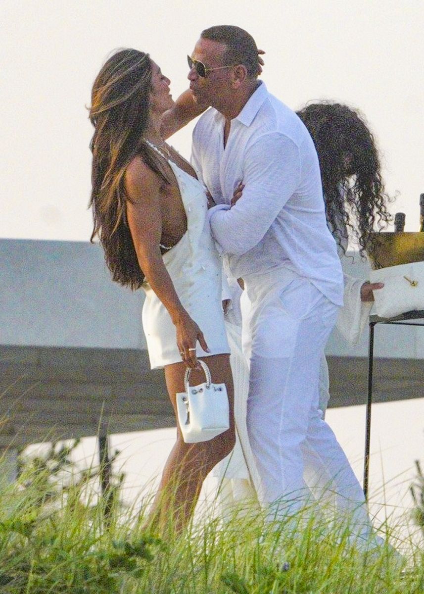 The former New York Yankees star and the unidentified brunette appeared affectionate as they enjoyed the celebrity-filled summer soirée.