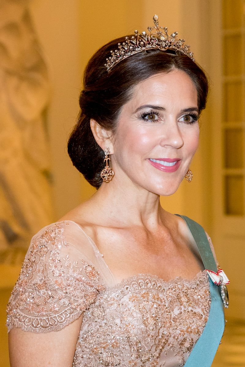 Mary joined her husband, then-Crown Prince Frederik, for his 50th birthday gala in 2018, accessorizing her embellished evening gown with the same privately owned tiara.