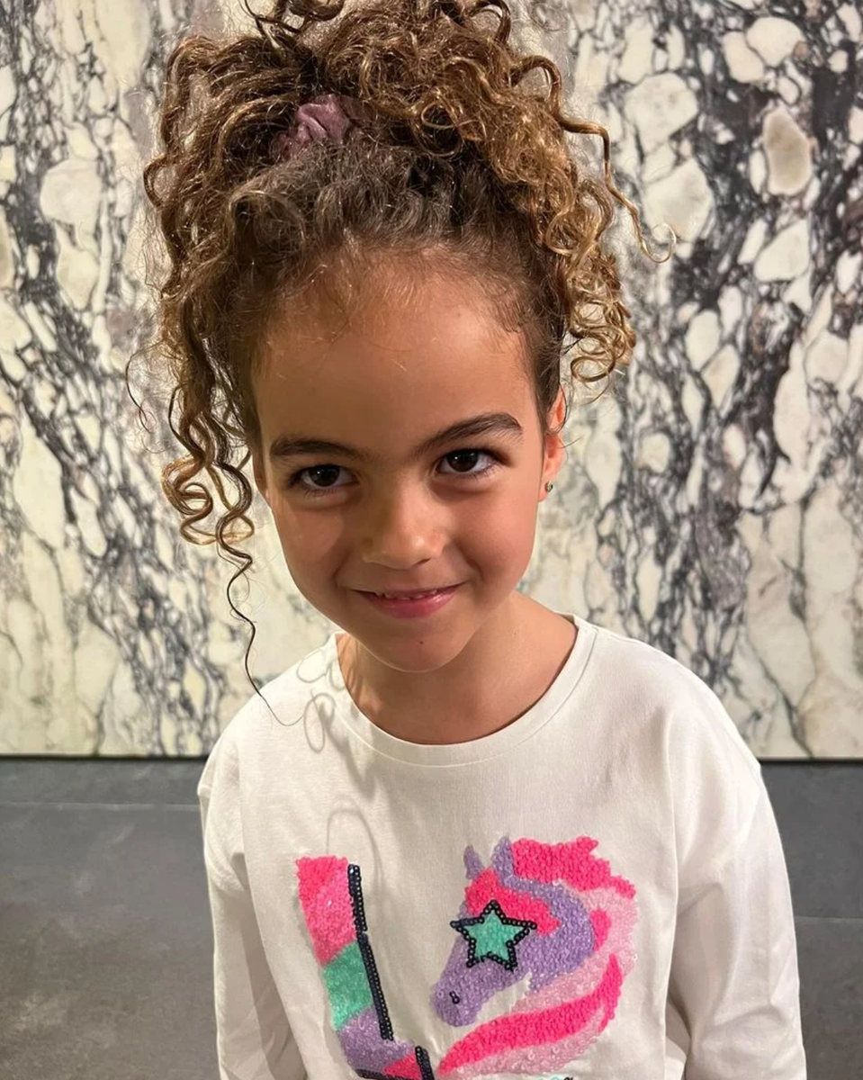 The model, beaming with mom pride, shared her 8-year-old’s progress in her singing lessons