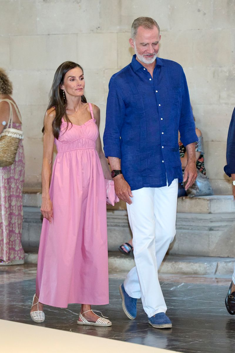For summer engagements, Felipe VI often turns to the guayabera, a relaxed alternative that remains appropriate for official appearances.