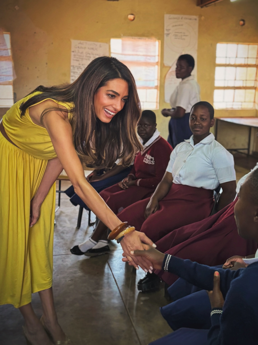 The human rights lawyer visited a girls’ school as part of her week-long stay in Malawi.