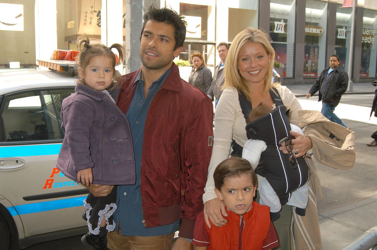 Kelly Ripa & husband Mark Consuelos & children Michael, Lola & Joaquin in kelly's arms (Photo by Robin Platzer/FilmMagic)