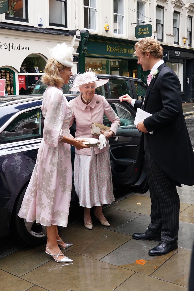 Princess Alexandra (centre) is greeted by her grandson James and his mother Julia Ogilvy for the wedding of her granddaughter Flora Ogilvy to Timothy Vesterberg