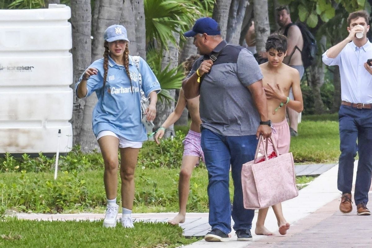 The singer took a break from her tour to relax by the ocean, playing in the sand and being silly with her kids.