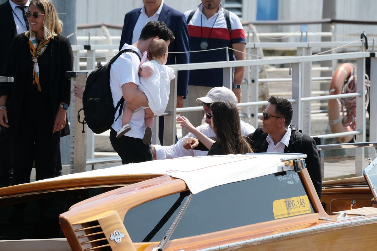 VENICE, ITALY - JUNE 26: Crown Prince of Jordan Hussein bin Abdullah, Rajwa Al Hussein and their daughter Iman Bint Hussein arrive at Venice Marco Polo airport ahead of Jeff Bezos and Lauren Sanchez Wedding on June 26, 2025 in Venice, Italy. (Photo by Stefano Mazzola/GC Images)