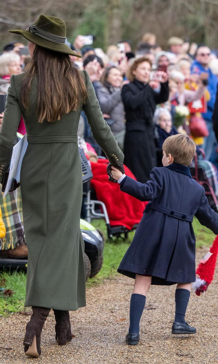 Come on, mom! Louis pulled Catherine's hand as they walked together