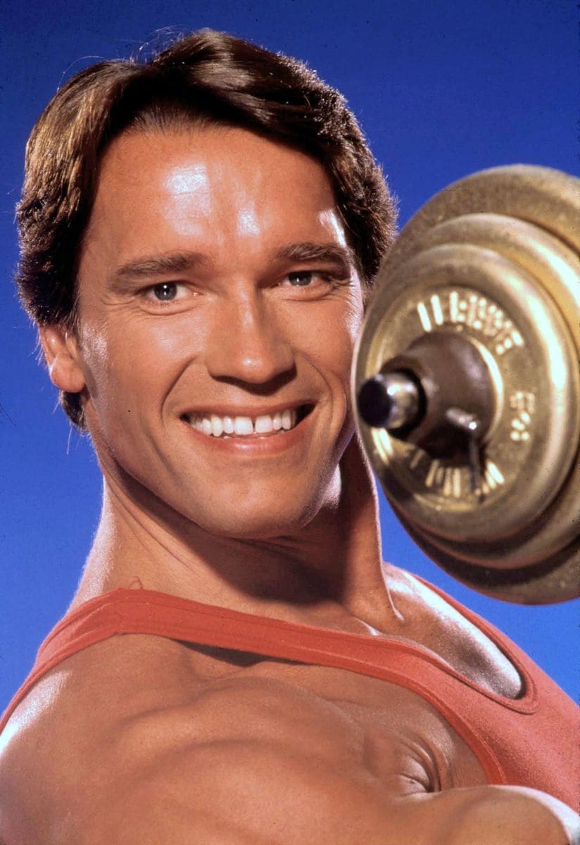 Body builder, actor and former Governor of California Arnold Schwarzenegger poses for a portrait Session on June 13, 1985 in Los Angeles, California.  (Photo by Harry Langdon/Getty Images)