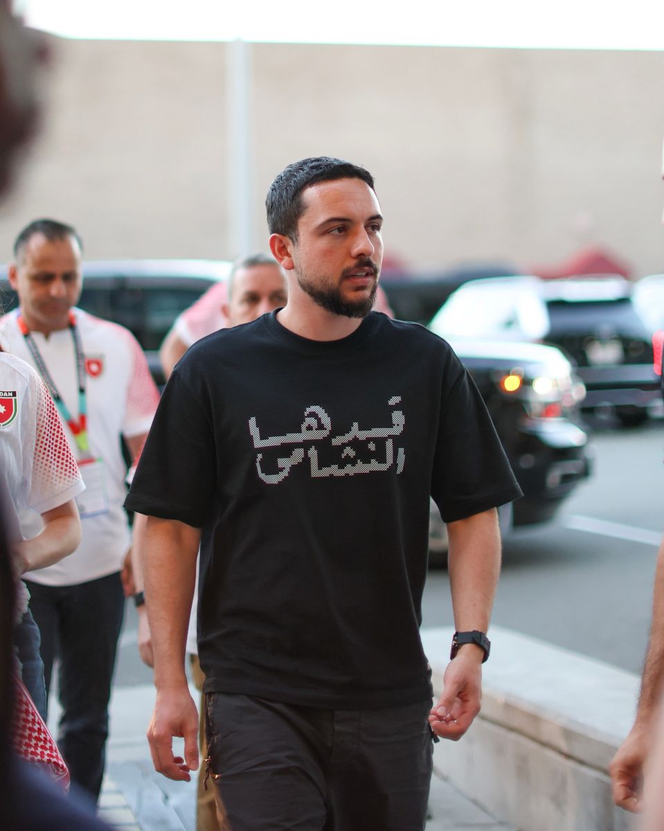 Crown Prince Hussein keeps it casual in a black graphic T-shirt and cargo pants while supporting Al Nashama in California.