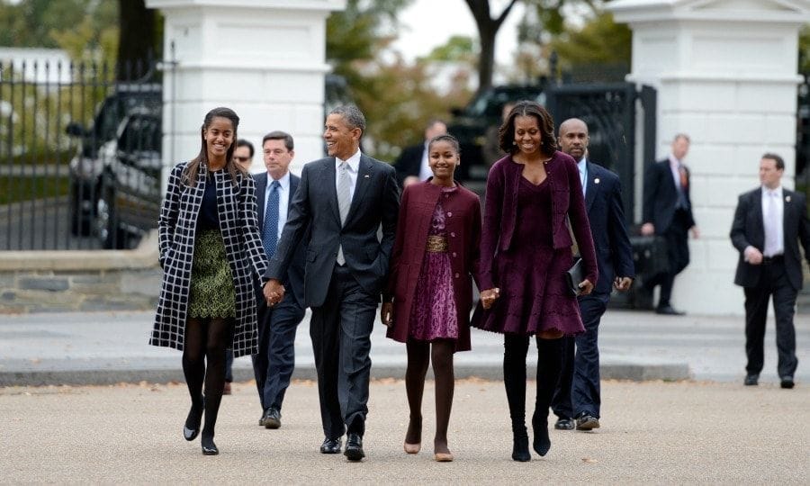<b>I got you babe</b>
"It's one of many ways that Barack shows me and the girls how special we are," Michelle shared on <i>The View</i> in 2012. "And that's the thing that touches me about him. I don't care what's on his plate. I don't care what he's struggling with. When he steps off that elevator into our residence he is Barack and dad. And there's just those little things that you do that remind you, that you know, I still got ya."
Photo: PA