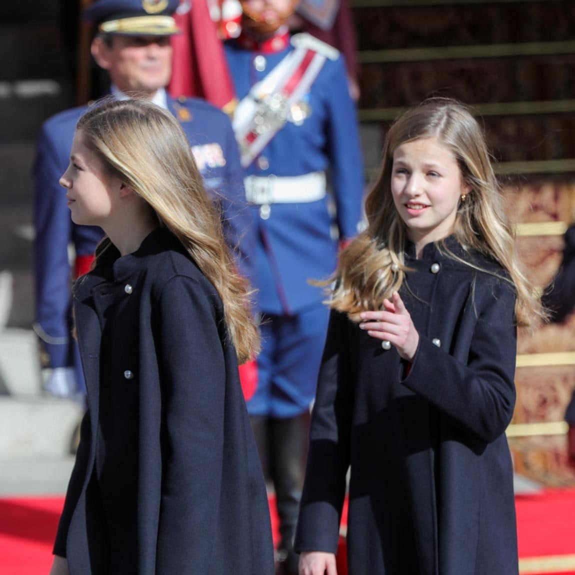 The sisters let their hair down for the outing. Leonor and Sofia appeared to be wearing the same coat with pearl buttons.