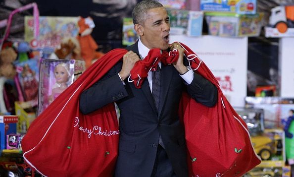 President Obama delivered a pair of giant red sacks filled with toys to the Marine Corps' annual Toys for Tots campaign