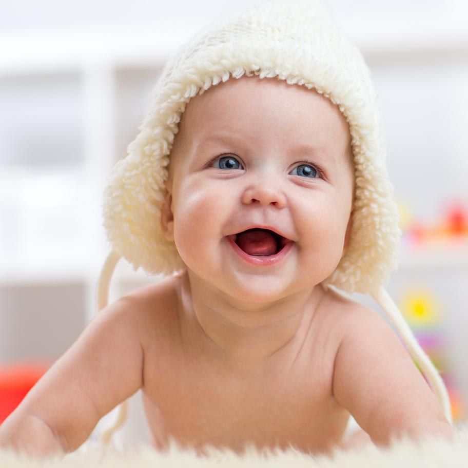 Smiling naked baby