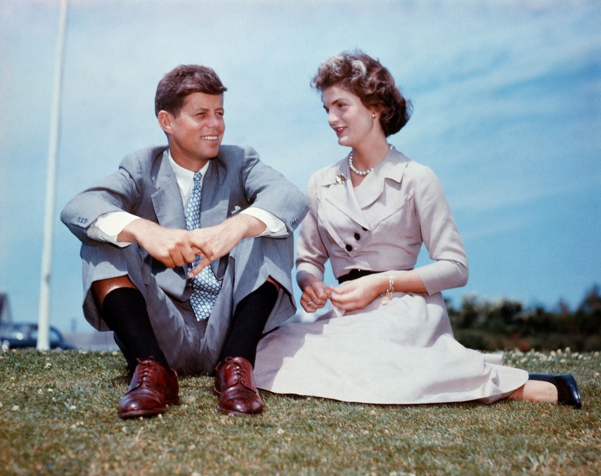 John F. Kennedy and Jacqueline Bouvier at Kennedy's family home at Hyannis Port, Massachusetts, a few months before their wedding.