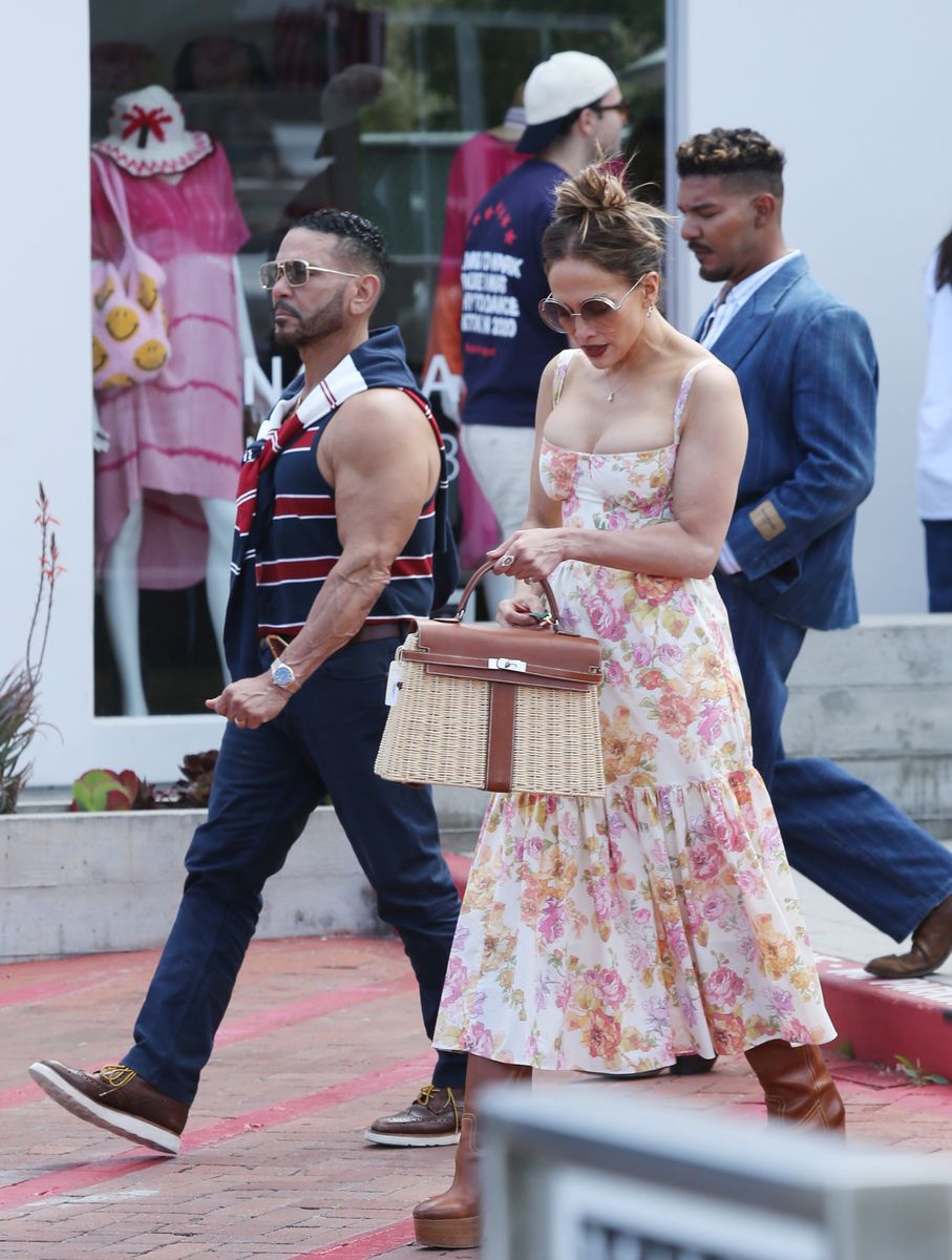 Her beauty look was equally on point. Lopez wore her hair in a relaxed, slightly tousled updo, with loose strands framing her face for that effortless, off-duty glow. 