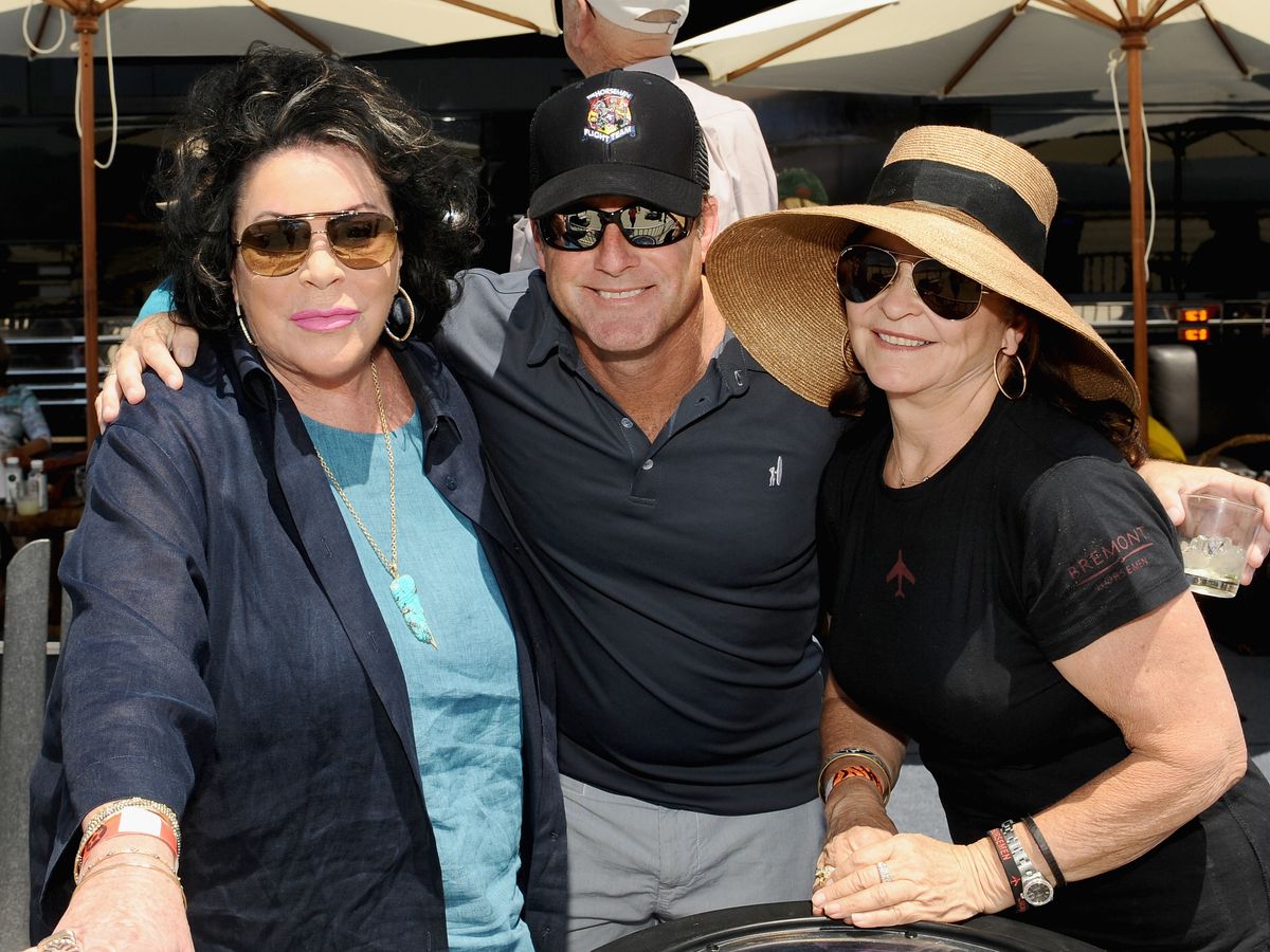 (L-R) Suzie Friedkin, Bradley Thomas and Eleanor Sanchez attend The Horsemen Flight Team Event Hosted By Dan Friedkin And Lauren Sanchez Whitesell, sponsored by Casamigos Tequila and Caliche Rum and sponsored by Casamigos Tequila and Caliche Rum on May 3, 2014 in Chino, California.  (Photo by Stefanie Keenan/WireImage)