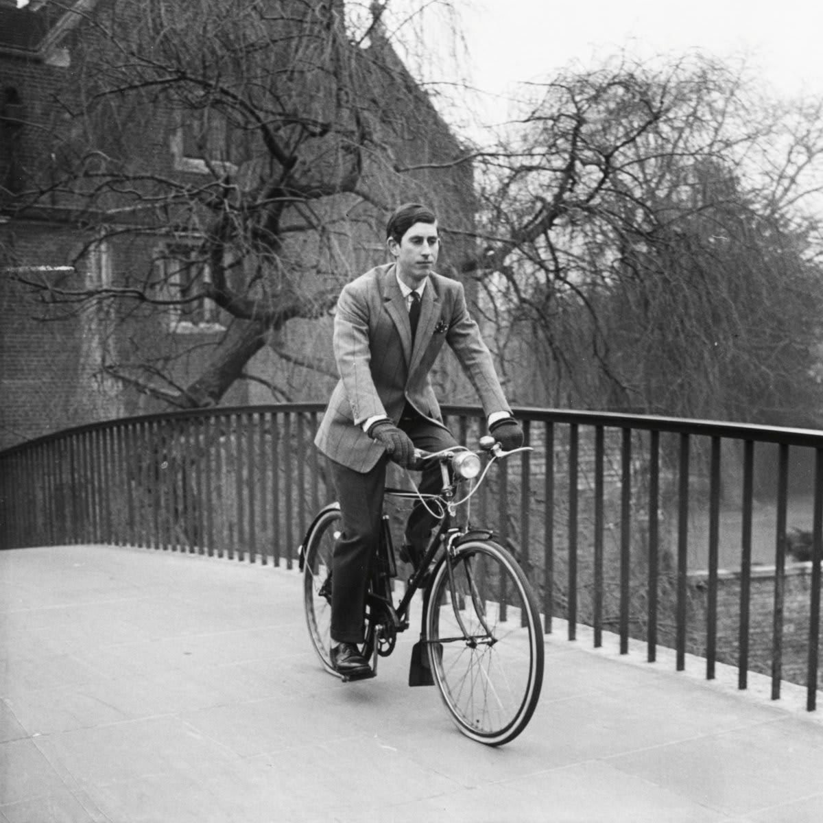 Prince Charles was photographed riding a bike across a bridge in 1969.