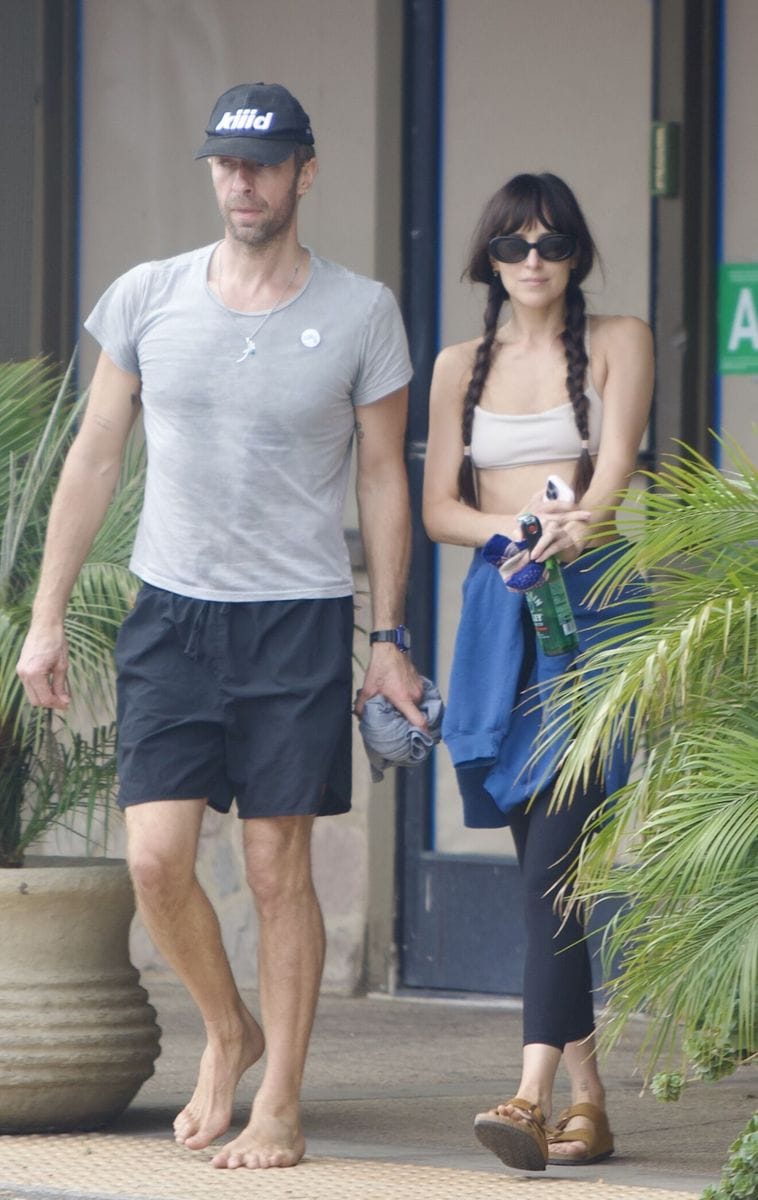 Chris Martina and Dakota Johnson