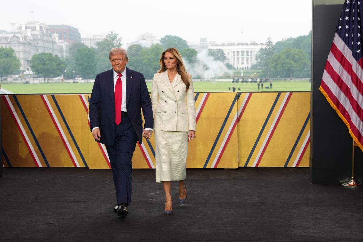 Melania Trump wore an ivory double-breasted blazer paired with a coordinating long skirt 