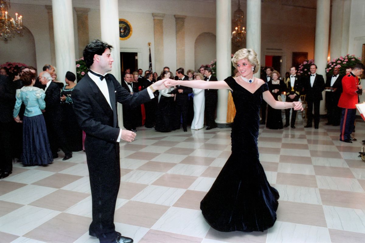 Princess Diana dances with John Travolta during a White House dinner in Washington, D.C., on November 9, 1985.