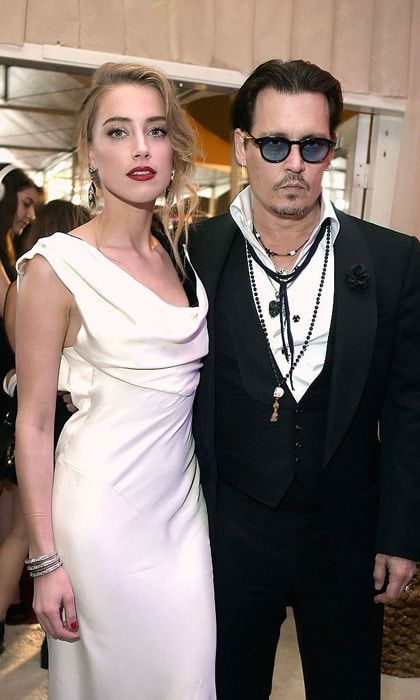 The Hollywood stars have reached a settlement in their high-profile divorce.
<br>
Photo: Jason Kempin/Getty Images