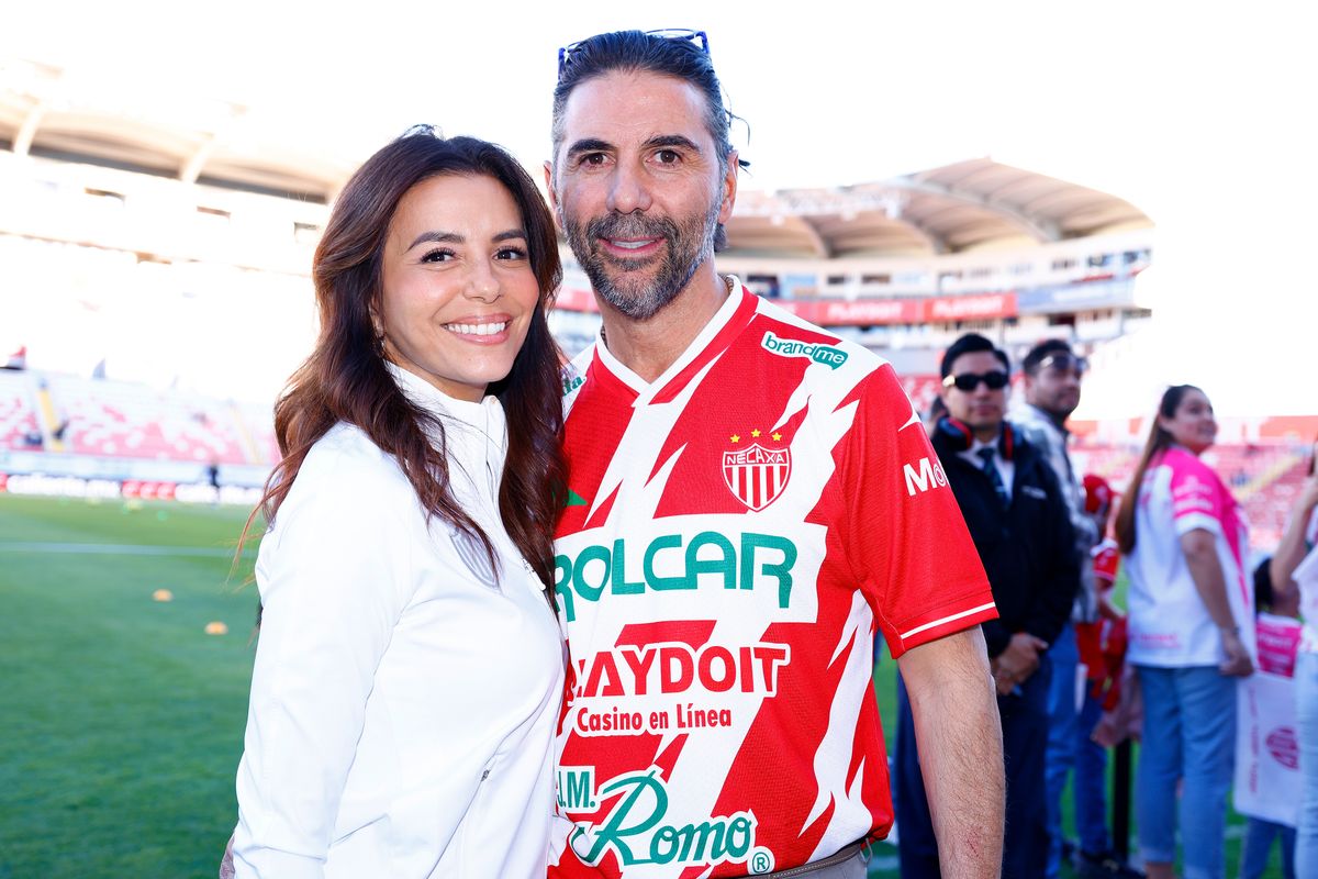 Eva Longoria shareholder of the Necaxa club and her husband Jose Antonio Pepe Baston Patino poses for a photo prior the 13th round match between Necaxa and Queretaro 