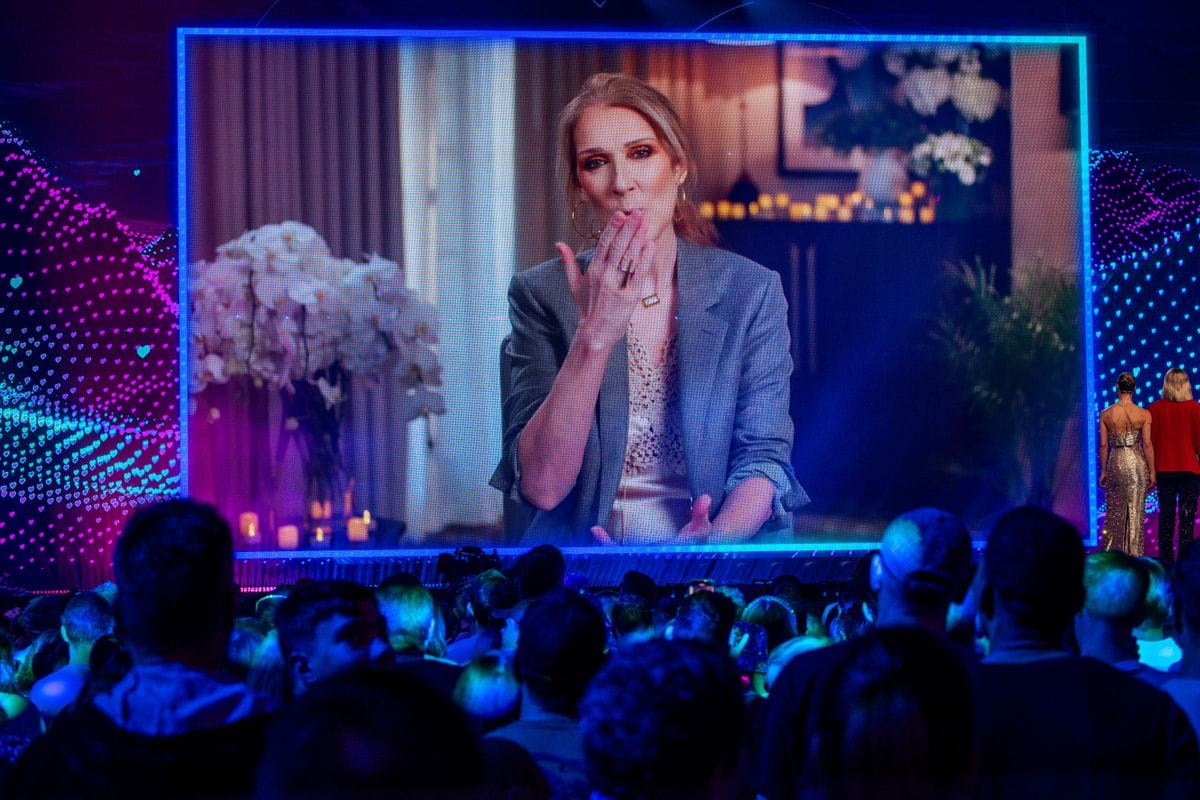 Celine Dion greets the audience for the final show of the 69th Eurovision Song Contest