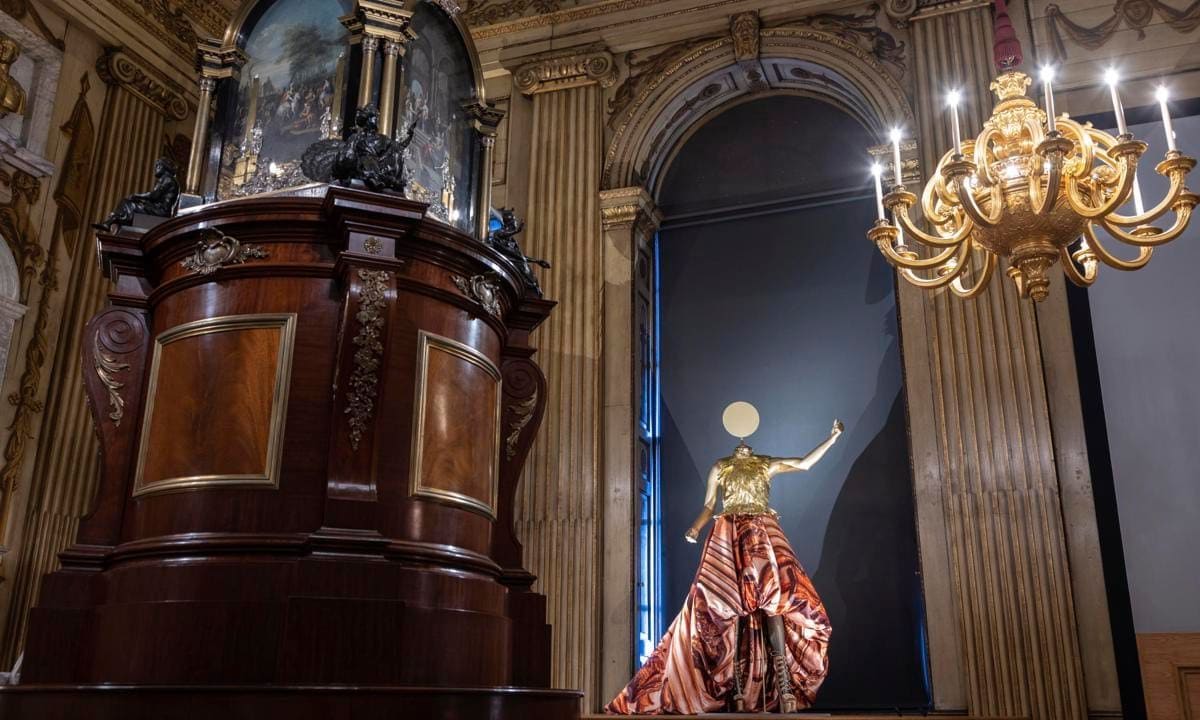 Billy Porter's Giles Deacon corset gown from the 2020 Oscars is displayed in the Cupola Room.