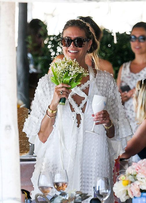 Heidi Klum s wedding latest bouquet throwing and official pic