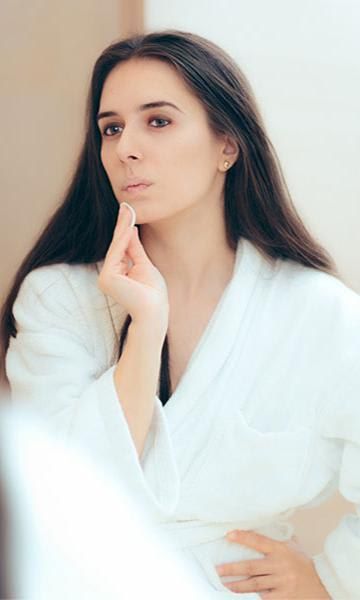Woman taking care of her skin
