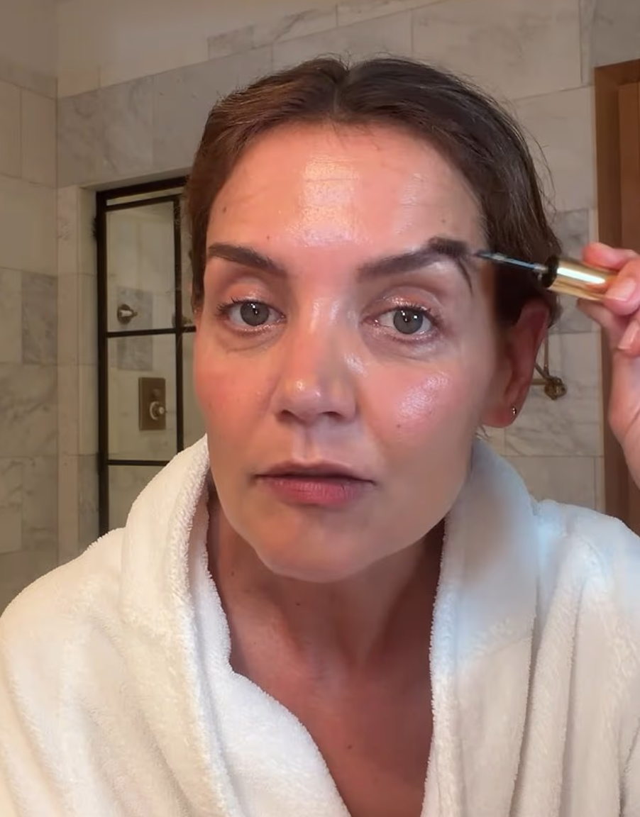 Holmes also credited her former Broadway co-stars, Zoey Deutch and Michelle Wilson, for helping her improve her eyebrow game during their run in “Our Town.”