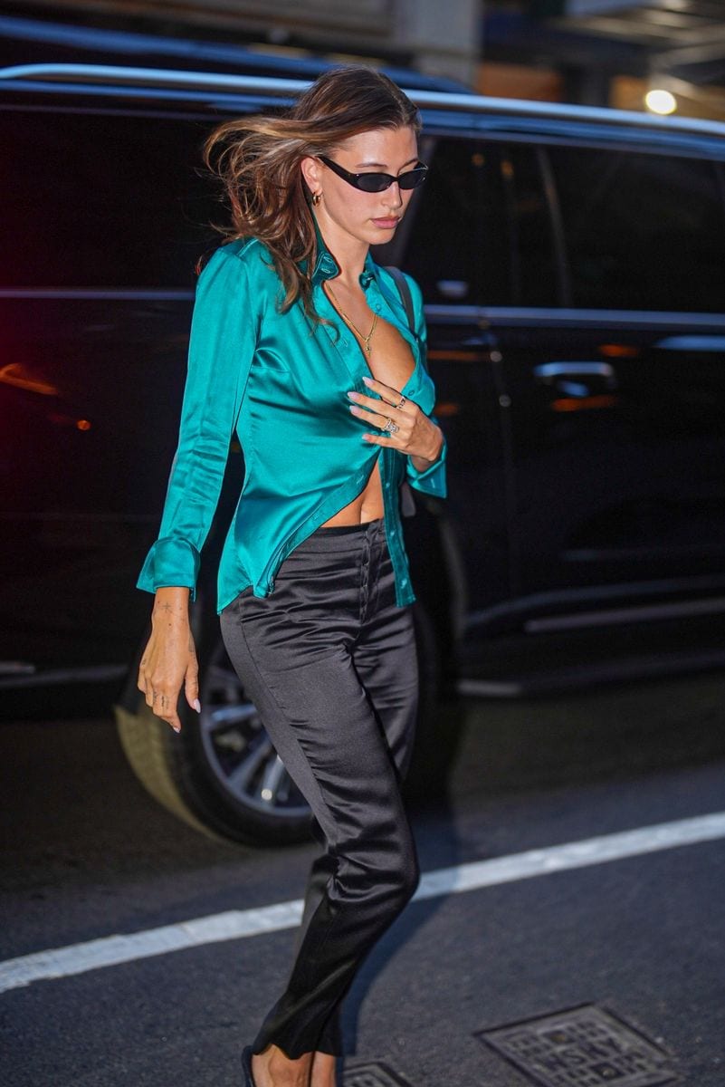 Both looks highlight the return of plunging necklines