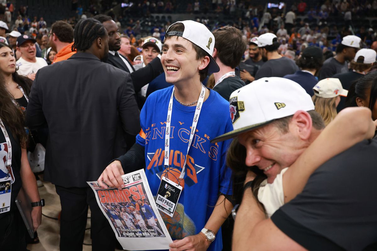 Timothée Chalamet celebrates after the New York Knicks' victory against the San Antonio Spurs