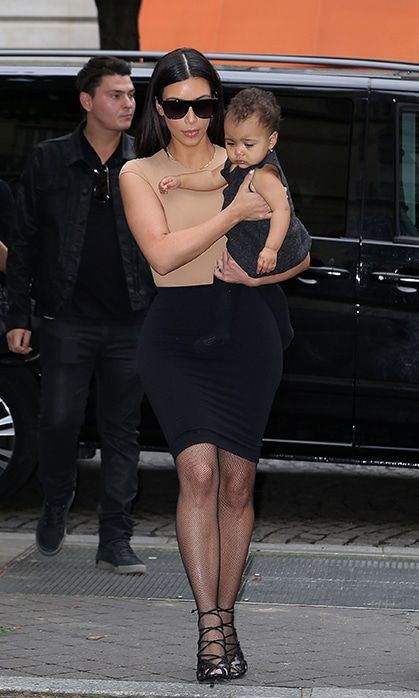 Kim knows what works on her curvy figure and sticks to nude tones and neutrals.