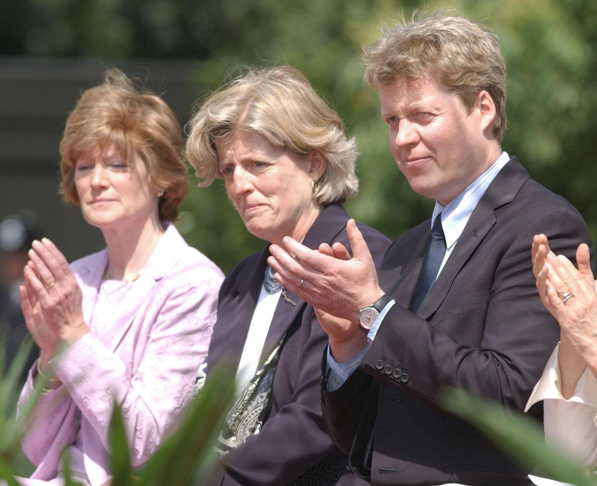 Princess Diana's siblings, Lady Sarah McCorquodale, Lady Jane Fellowes and Earl Charles Spencer, attend the opening of the Diana Memorial Fountain in London's Hyde Park.