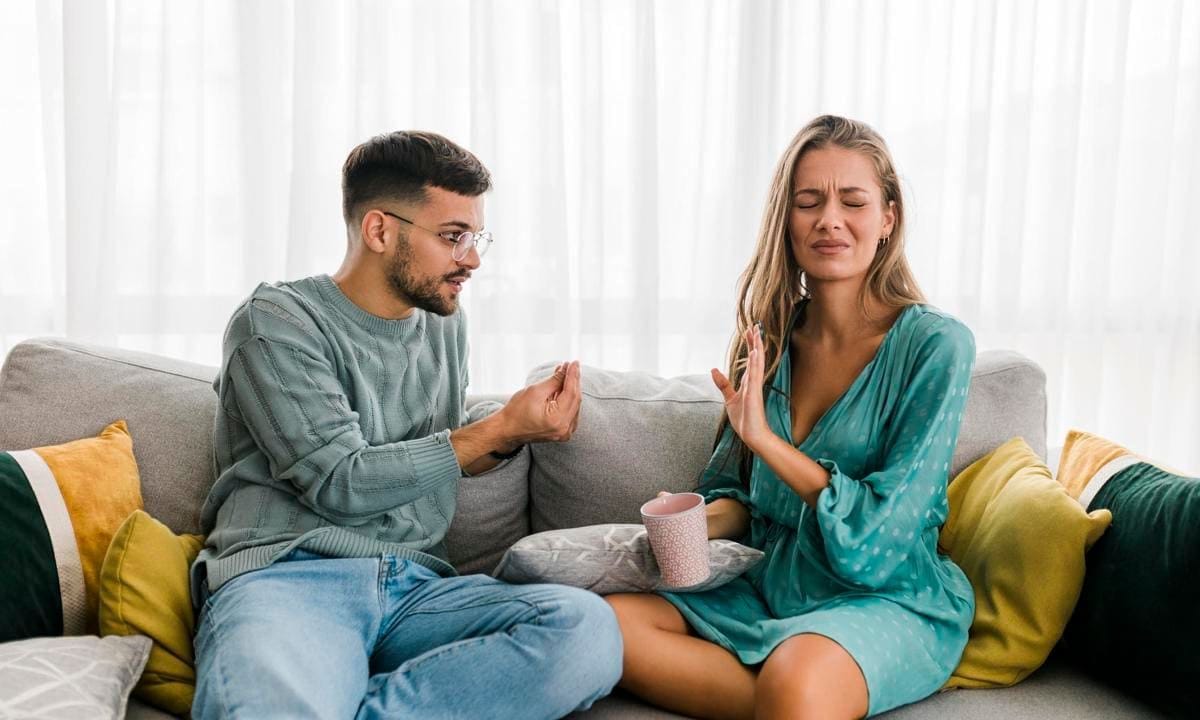 Shot of a young couple having an argument at home