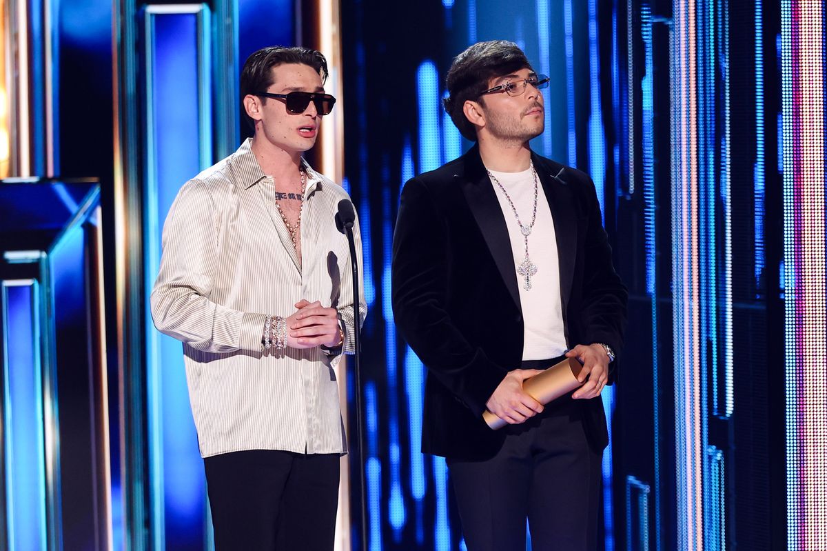 Peso Pluma and Tito Double P accept the Top Latin Album del Año award for "DINASTÃ"