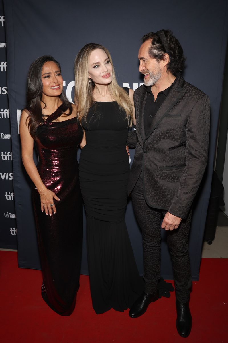 Salma Hayek Pinault, Angelina Jolie, and Demian Bichir attend the premiere of "Without Blood" during the 2024 Toronto International Film Festival