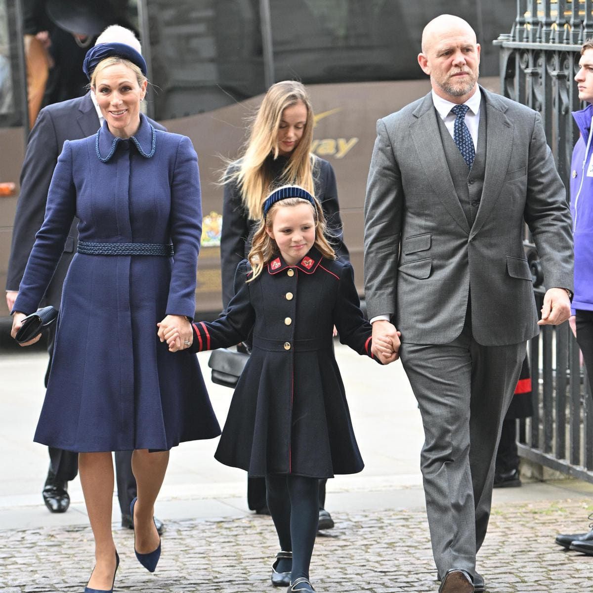 Queen Elizabeth's granddaughter Zara Tindall and her husband Mike Tindall arrived holding hands with their eldest child, Mia Tindall.