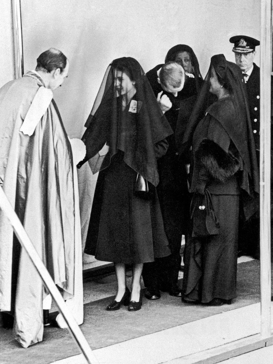 When she landed in London, she was required to remain on the aircraft until a black dress was brought to her.