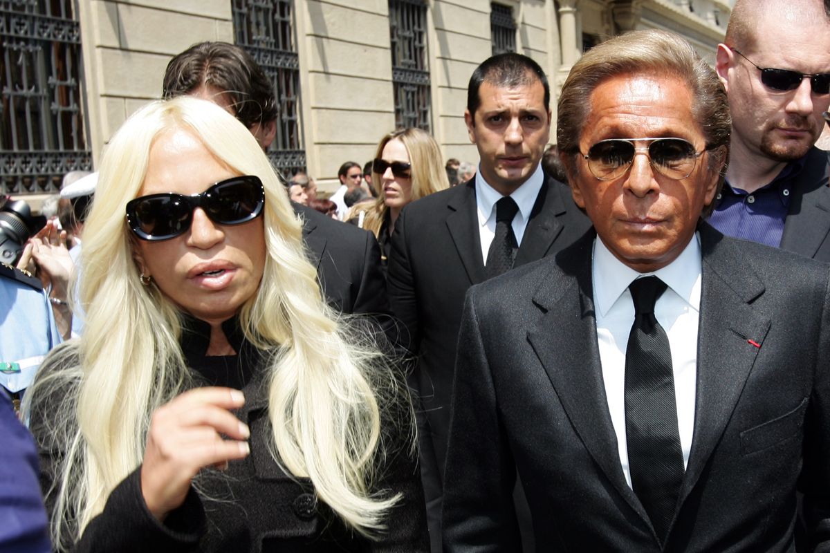 Valentino Garavani (R) and Donatella Versace arrives at the funeral of Italian designer Gianfranco Ferre at St. Magno Church on June 19, 2007 in Legnano, Italy. The funeral for Ferre, who died on June 17 at the age of 62 after suffering a massive brain hemorrhage, was held in the northern Italian town where he was born. (Photo by Getty Images)