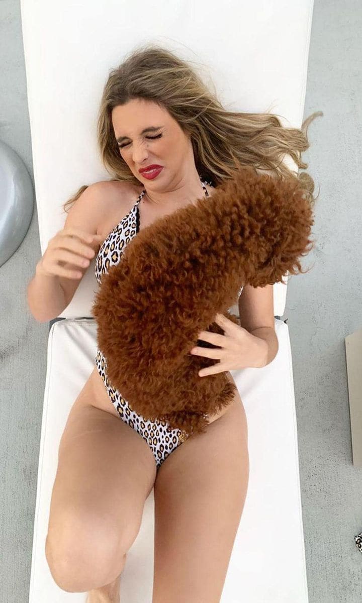 Lele Pons' pet Toby jumping on top of his owner