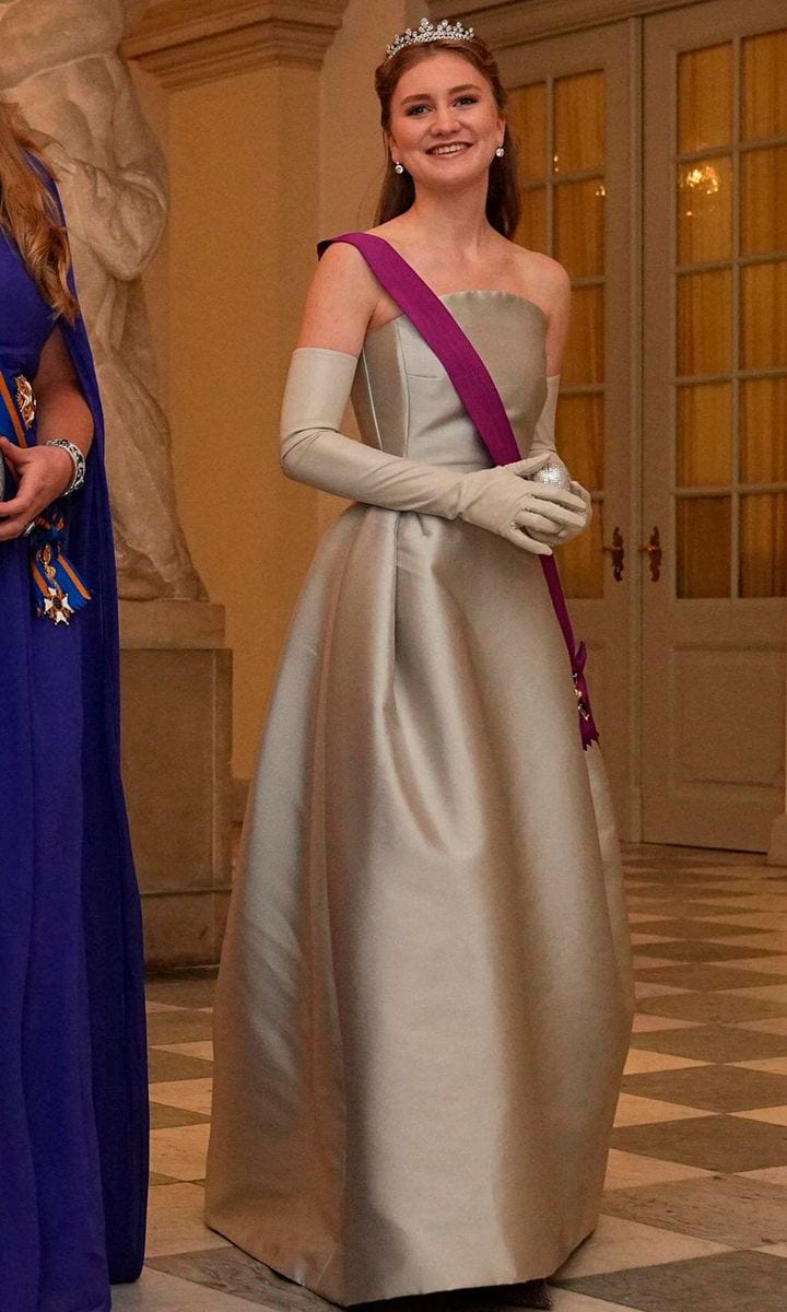 Princess Elisabeth of Belgium opted for a strapless ballgown paired with matching gloves and The Wolfers Tiara.