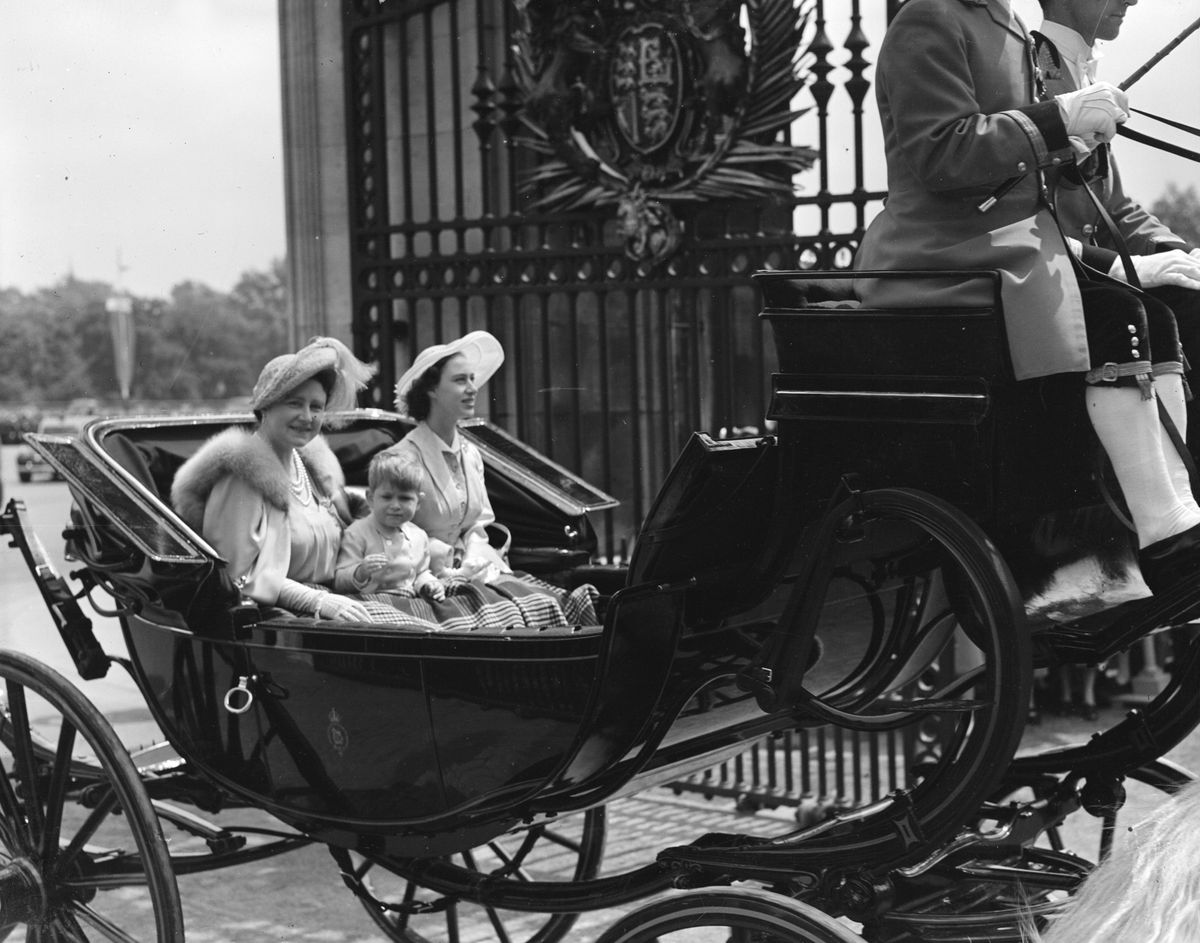 7th June 1951: Queen Elizabeth, Queen Consort to King George VI with Princess Margaret Rose (1930 - 2002) and Prince Charles returning to Buckingham Palace after the Trooping The Colour ceremony