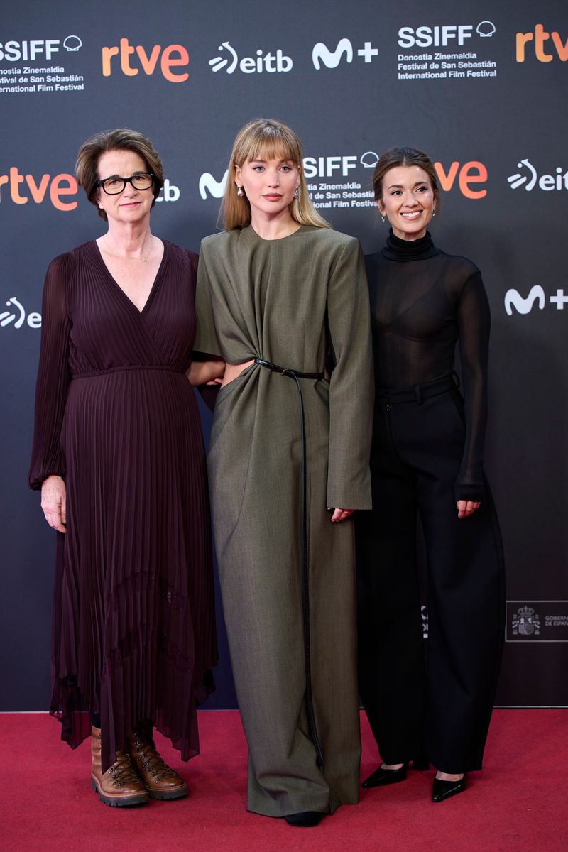 Andrea Calderwood, Jennifer Lawrence and Justine Ciarrocchi attend the "Die My Love" red carpet during the 73rd San Sebastian International Film Festival 