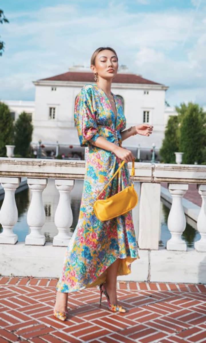 Jessica Wang in a floral print slip dress