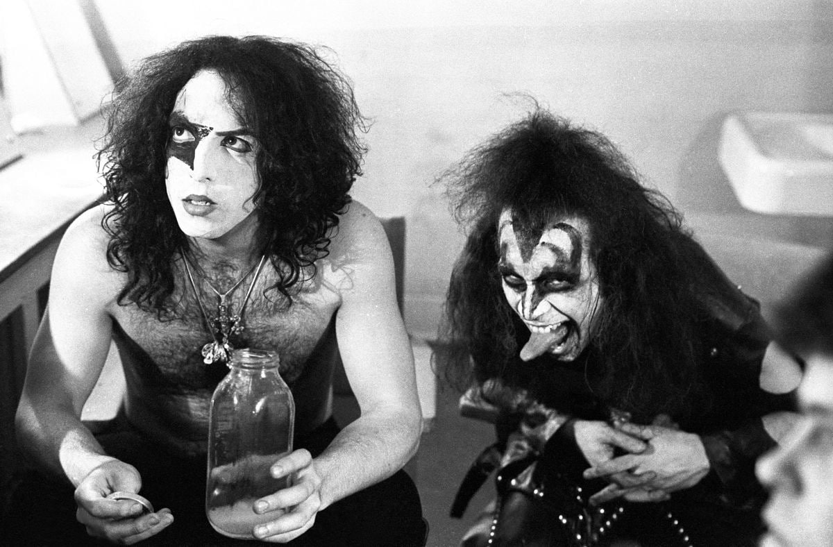 Paul Stanley and Gene Simmons of the rock and roll band 'Kiss' pose for a portrait session backstage on May 31, 1974